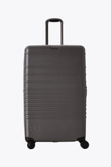 The Large Check-In Roller in Charcoal